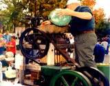 apple cider press in operation