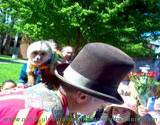 monkey sitting on trainers shoulder while entertaining children at Penn State Altoona Art Festival