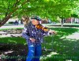 fiddler entertaining visitors to Penn State Altoona Art Festival
