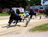 A photo of a harness race at Clearfield County Fair