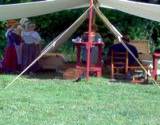 photo of a reenactment tent and re-enactors staying at Central Pennsylvania historic landmark Fort Roberdeau