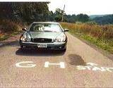 A photo of car stopped on Gravity Hill