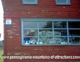 The Historic Hotel Lincoln in Bedoford County view of window and Lincoln Highway sign famous for its haunted PA brothel