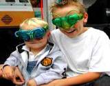 Penn State Festival two boys with bug mask