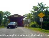 A piece of Pennsylvania history covered bridge leading to the Old Bedford Village