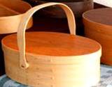 A photo of handmade baskets with lids