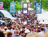 A huge crowd gathers on the streets of State College Central Pennsylvania of the Arts Festival