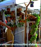 craft booth at Seven Springs Resort Autumnfest displaying handmade bird houses