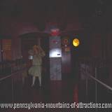 photo taken of the reproduction of woman on a bridge at annual ghost hunt at the Altoona Railroaders Memorial Museum