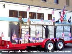 photo of a replica of The Wall in Veterans Day Parade