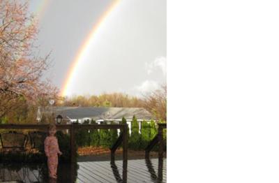 Rainbow above my Daughter