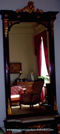 Mirror at Baker Mansion with picture of ghost reflection caught in the corner