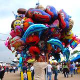 A man selling balloons at the Clearfield County Fair