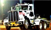 A tractor trailer painted like a cow, one of the stunt shows at Clearfield County Fair.