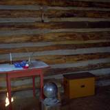 photo of the inside of a cabin and desk at Central Pennsylvania historic landmark Fort Roberdeau