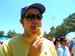 A teenage guy sampling the free garlic ice cream at the Pocono Garlic Festival