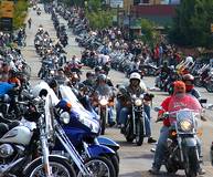 parade of bikers coming the streets