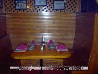 photo of a booth section inside Jean Bonnet Tavern