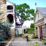 A side view of Jean Bonnet Tavern and outside dinning area