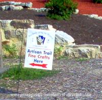 Artison Trail sign in front of Jean Bonnet Tavern