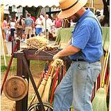 A photo of a broommaker at the Kutztown Fair