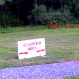 A sign showing way to helicopter rides at Prince Gallitzin State Park's Mountain Days