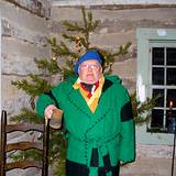 photo of an elf standing outside at Old Bedford Village Colonial Christmas event