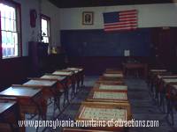 photo of a one room schoolhouse classroom at Old Bedford Village 