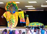 A photo of puppet show displaying energy power to children at the Pennsylvania Renewable Energy Festival