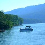 small pontoon boat on Raystown Lake