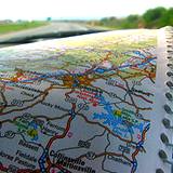 image of reading a road map while travelling in car