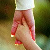 a photo of mother and child holding hands