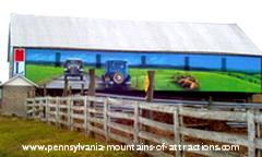 Mural of Lincoln Highway on side of barn along Historic PA Lincoln Highway